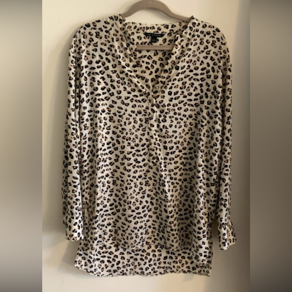 Zac & Rachel- cheetah print blouse 
Buttons on front